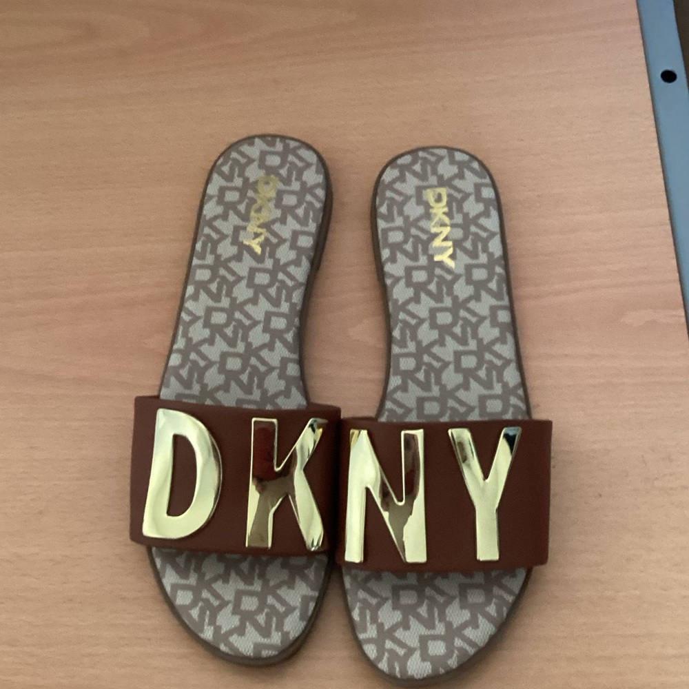 DKNY Gold and Brown Logo Slides